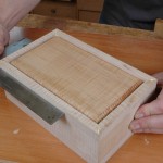 Use a little hand pressure to square the box.