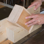 This shop-made table saw jig makes quick work of reinforcing miter 