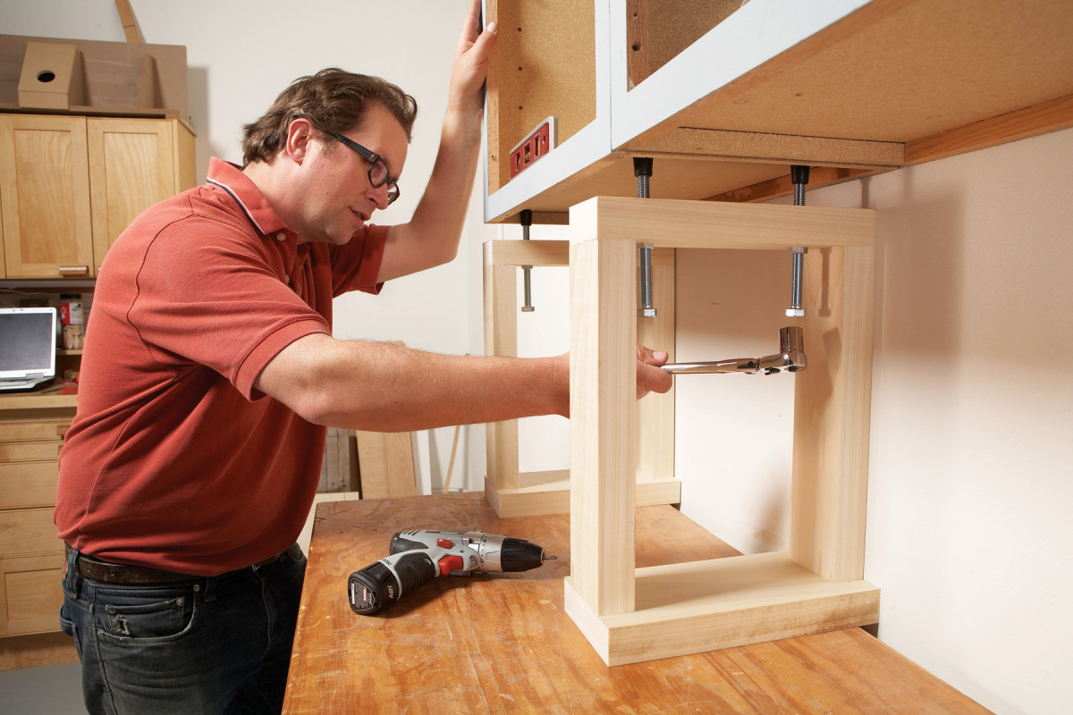 Hang cabinets alone with the T-JAK Original Cabinet Jack 