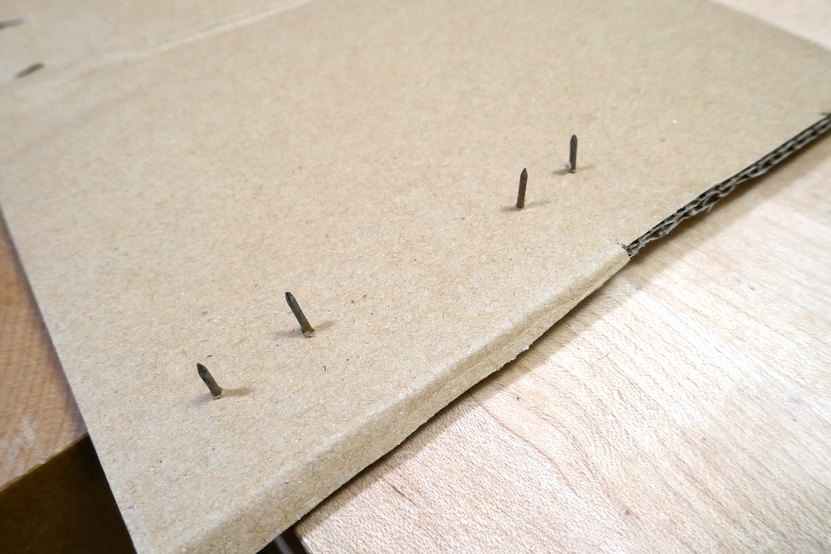 Nails and Cardboard A Clever Technique for Finishing Parts Popular