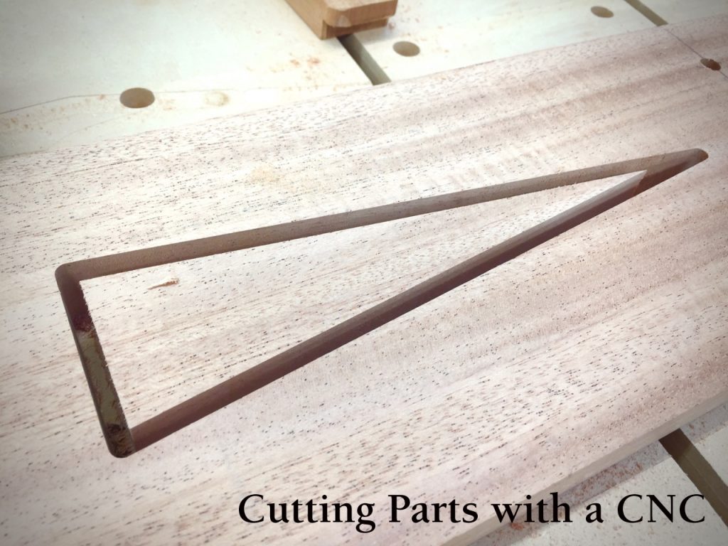 Precisely cutting a narrow triangle-shaped opening with power and/or hand tools is anything but simple. Cutting parts and precise details are tasks well suited for digital woodworking and CNCs.