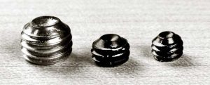 Finer threads on setscrews grip better.