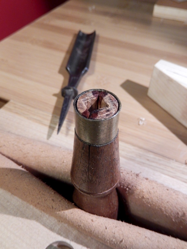 Inserting the ferrule over the handle's shoulder