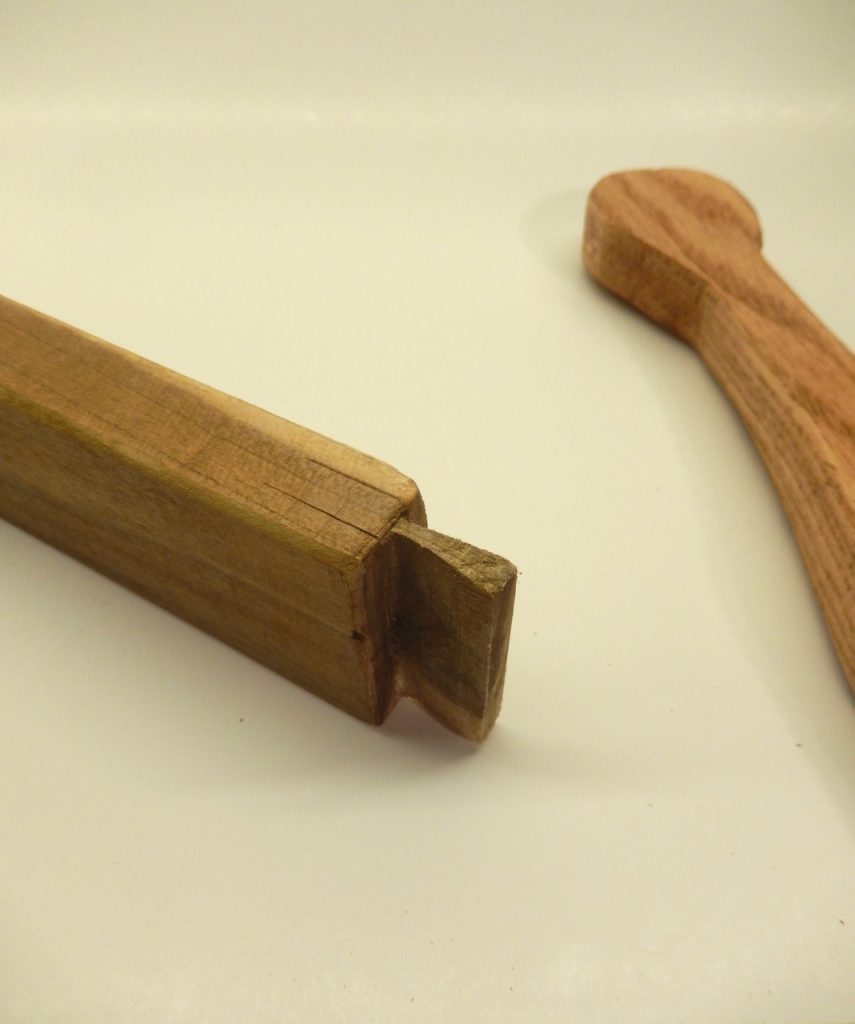 In a few cases a student over cut his or her tenon and in two cases we had to glue a wood shim over and after the glue dried to re-shape the tenon. 