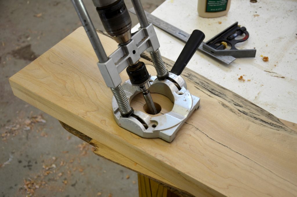 Drilling the leg's mortise. 