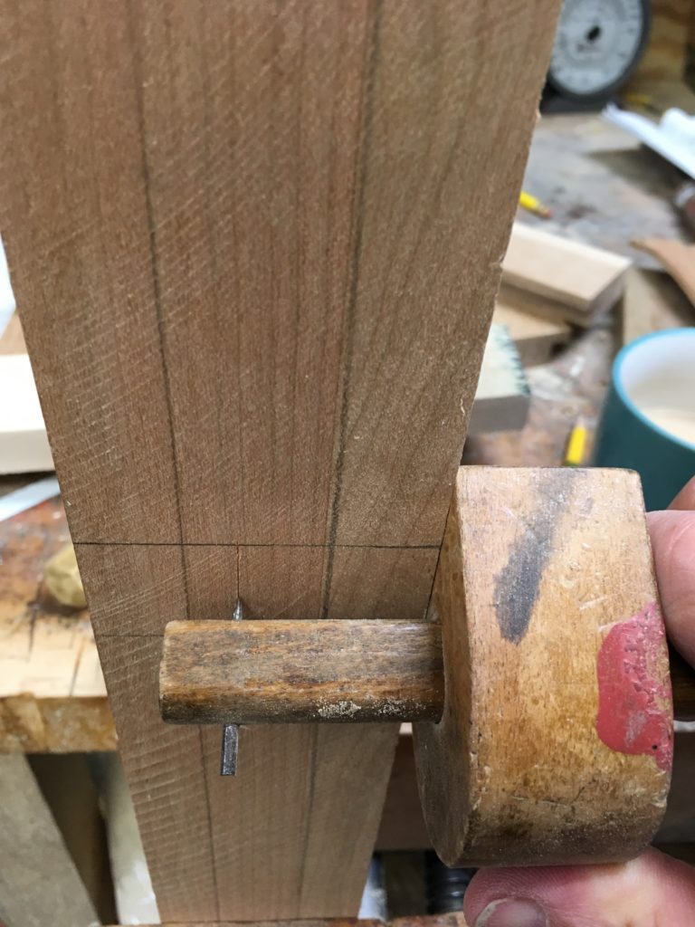 A notched, tenoned joint for stretchers of tables and chairs