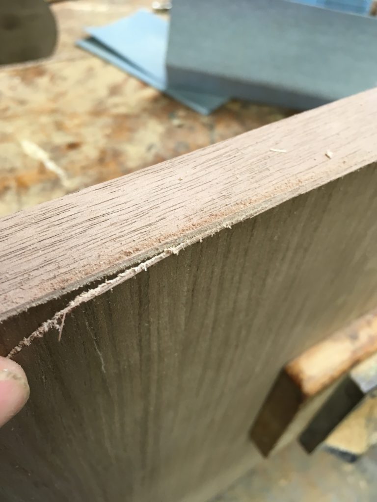 edge banding architectural veneer in a small shop