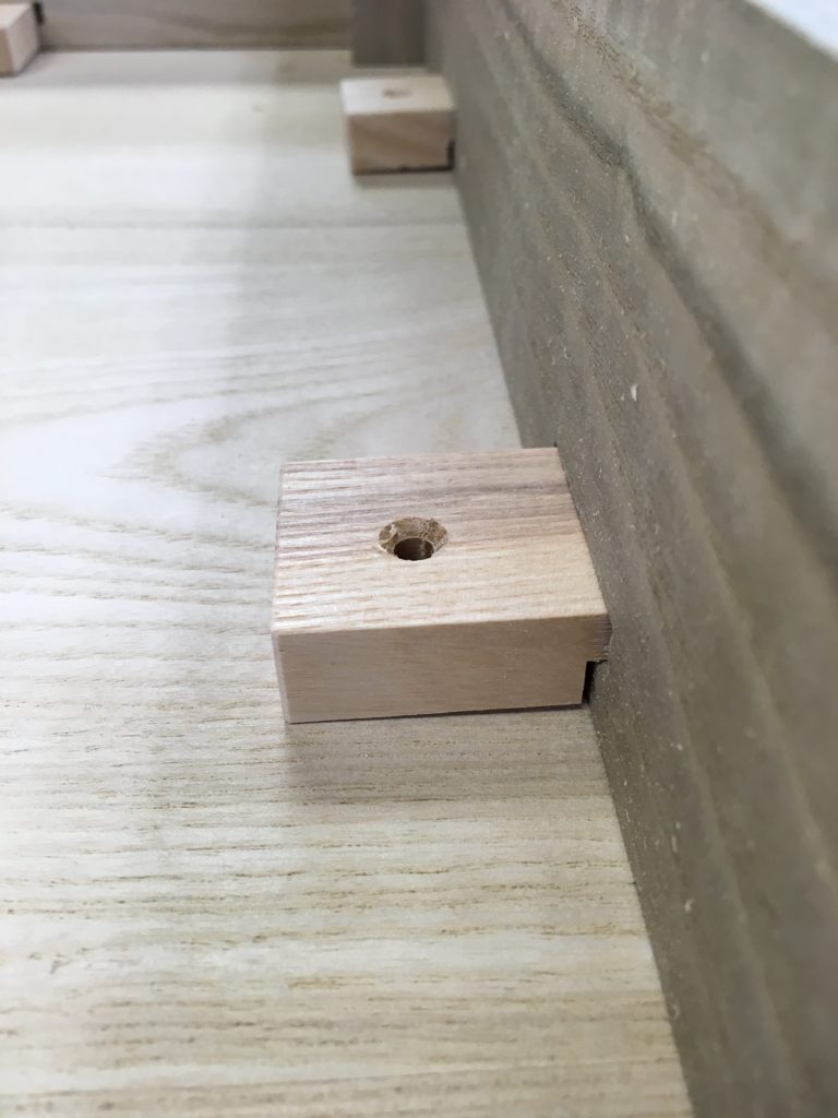 attaching a table top with traditional wooden buttons