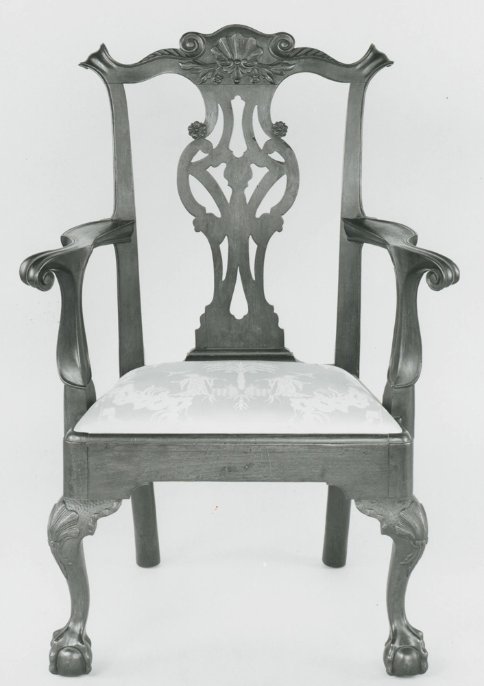 A Philadelphia ball and claw foot arm chair.