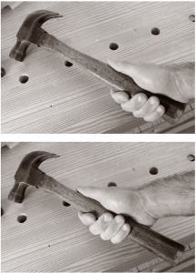 Gripping the hammer at the end of the handle (at top) increases the power in your stroke. Gripping it up at the swelling (below) reduces your power and can increase your accuracy. Note the extended thumb on both grips – this will also improve your accuracy.
