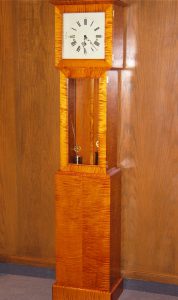 This curly maple tall-case clock was made and finished by a friend of mine