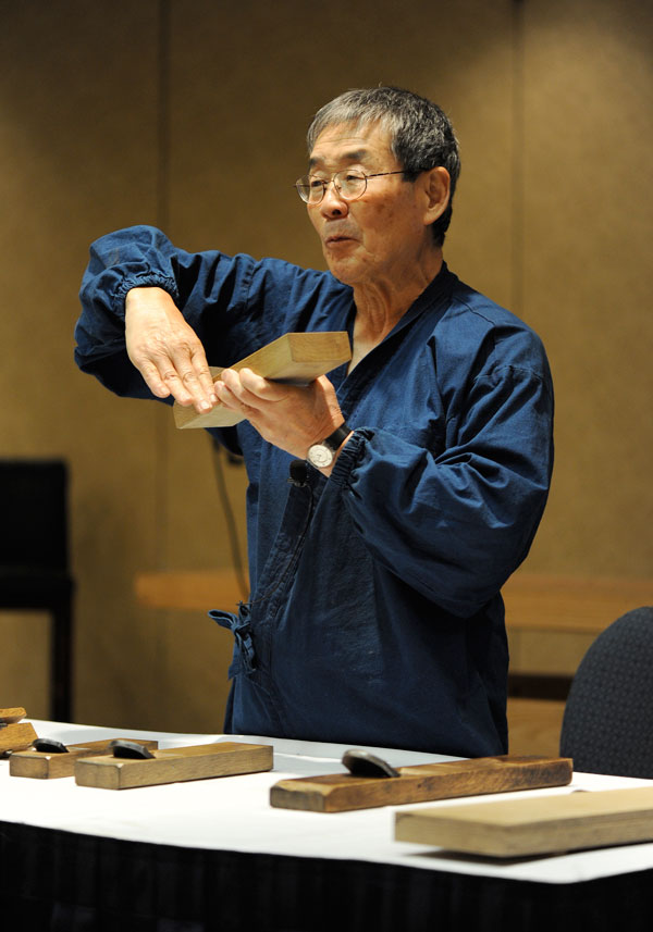 Toshio Odate discussing Japanese planes at Woodworking in America 2009, in Valley Forge, Penn. Photo my Megan Fitzpatrick