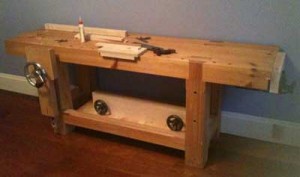 My Roubo-style bench at home, with a Benchcrafted Glide vise (and Benchcrafted twin-screw stored underneath).