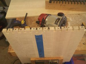 Building a hope chest with dovetailed joints is easier with this jig.