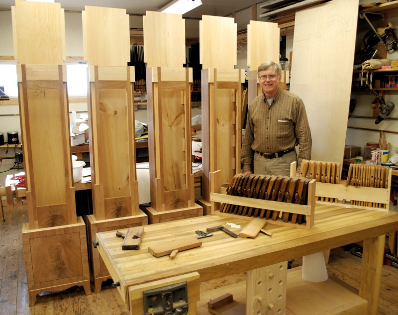 That's me in my shop with reproduction clock cases based on accurate photographs I've taken.
