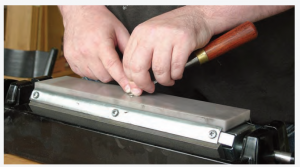 Joel Moskowitz advocates for the freehand method in tool sharpening.
