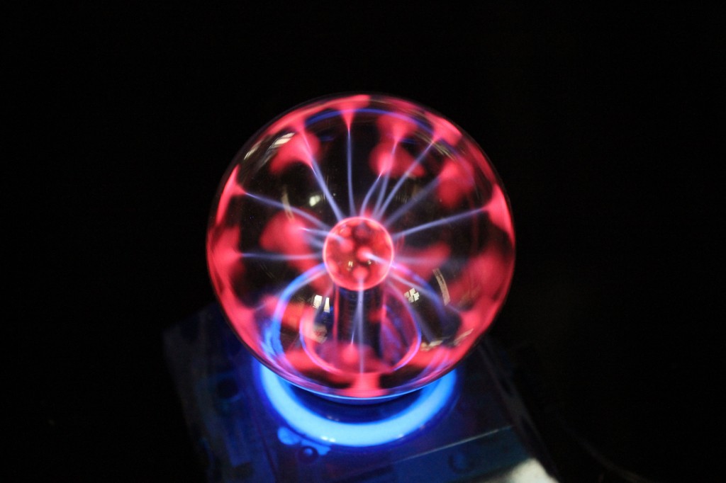 This toy, called a plasma globe, effectively demonstrates electricity build-up in a DIY dust collector.