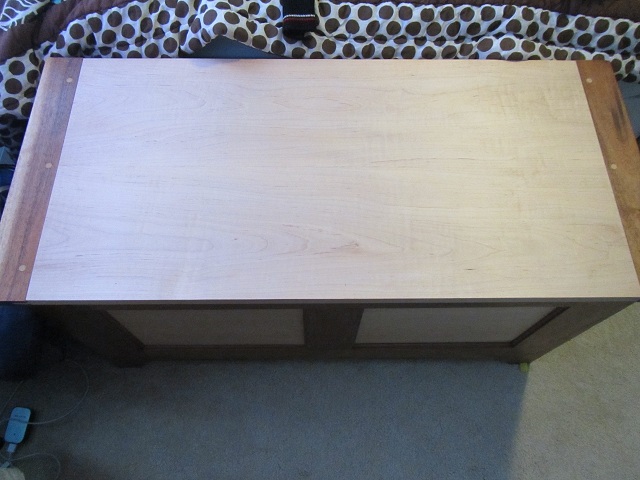 Top view of the hope chest, showing the lid. I chose breadboard ends (rabbet and groove) with contrasting dowels.